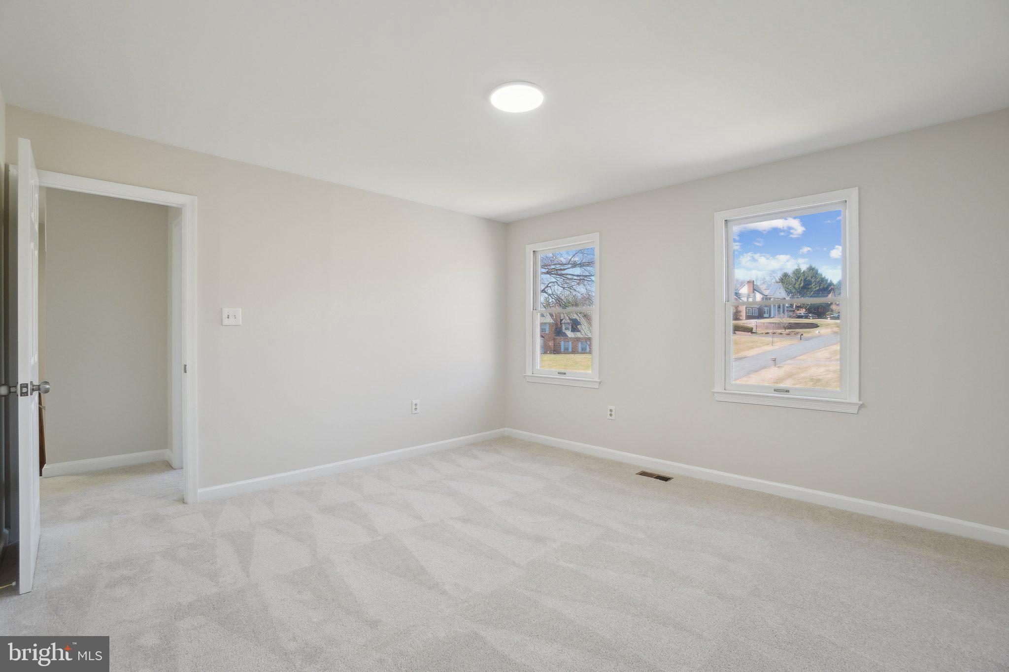 15301 Watergate Road Silver Spring, MD 20905 - Photo 23 of 51 an empty room with windows