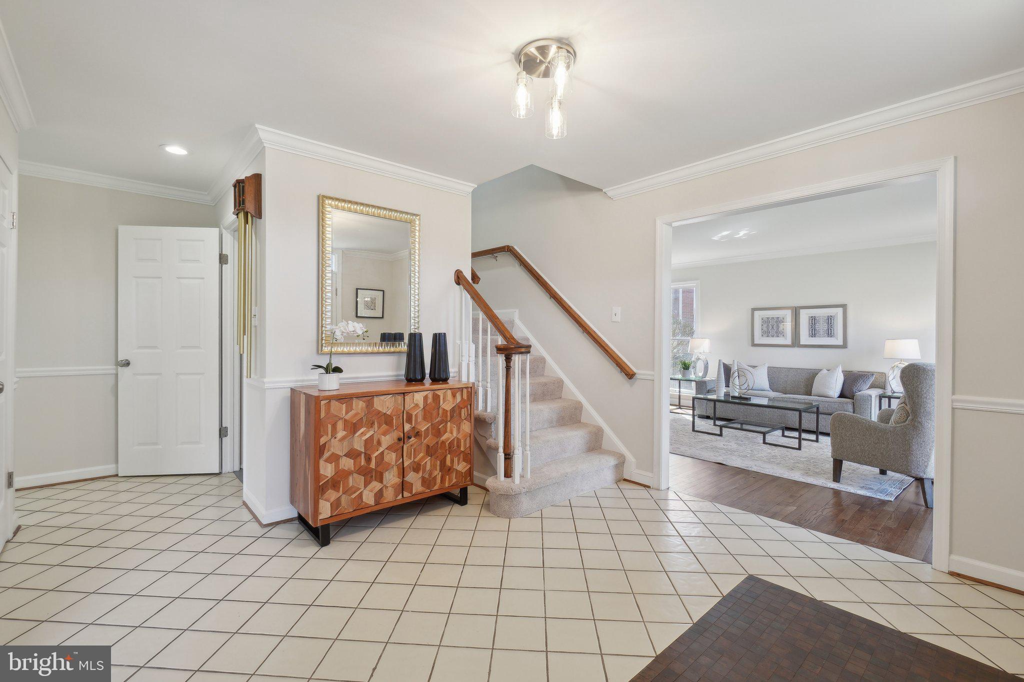 15301 Watergate Road Silver Spring, MD 20905 - Photo 3 of 51 a living room with furniture and wooden floor