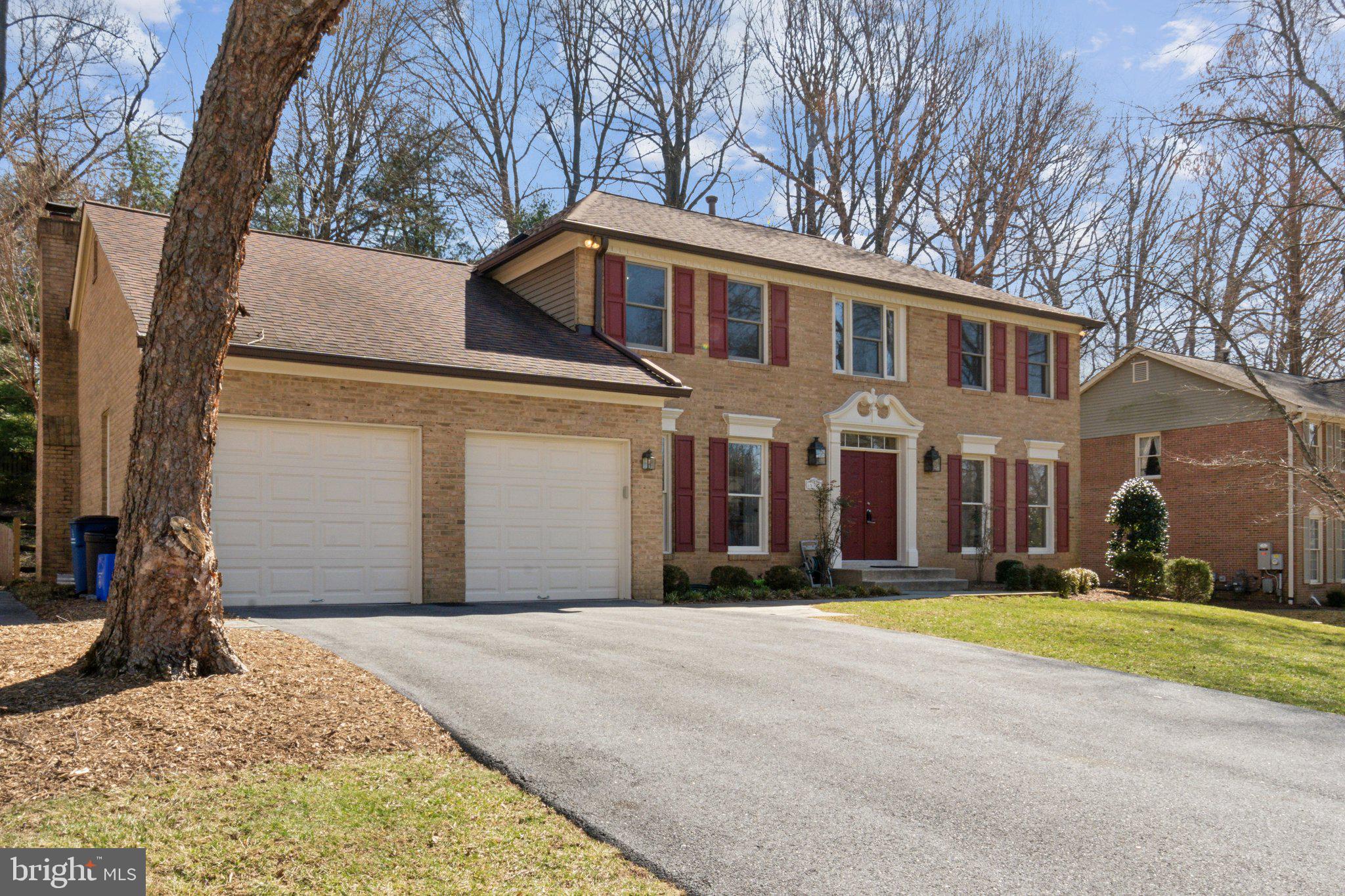 15301 Watergate Road Silver Spring, MD 20905 - Photo 35 of 51 a front view of a house with a yard