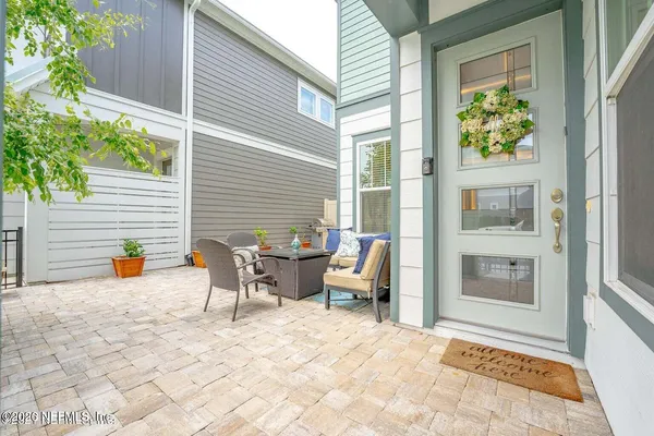 a view of a outdoor space with a patio