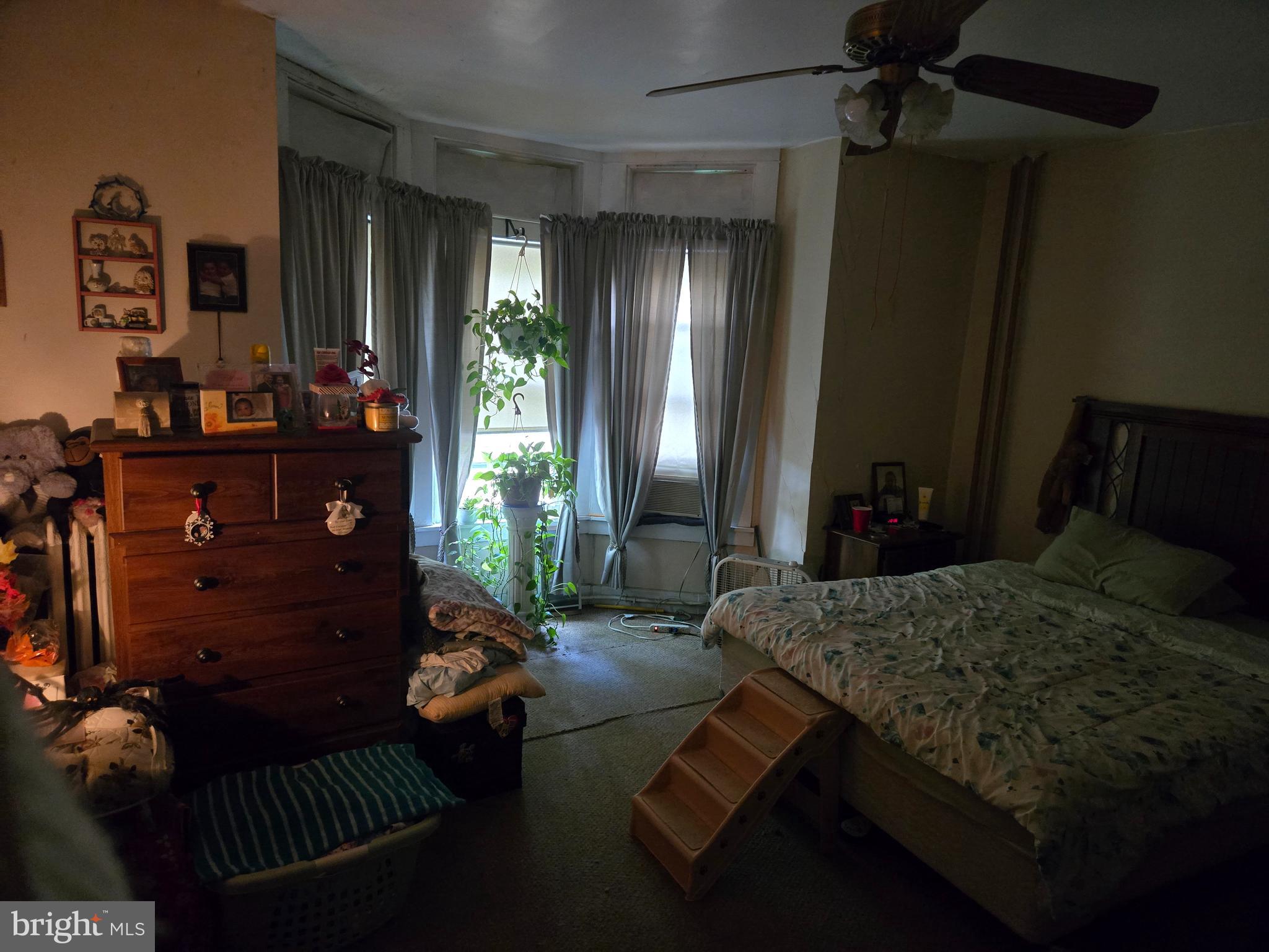 1238 Eckert Avenue Reading, PA 19602 - Photo 12 of 15 a bedroom with a bed dresser and a mirror