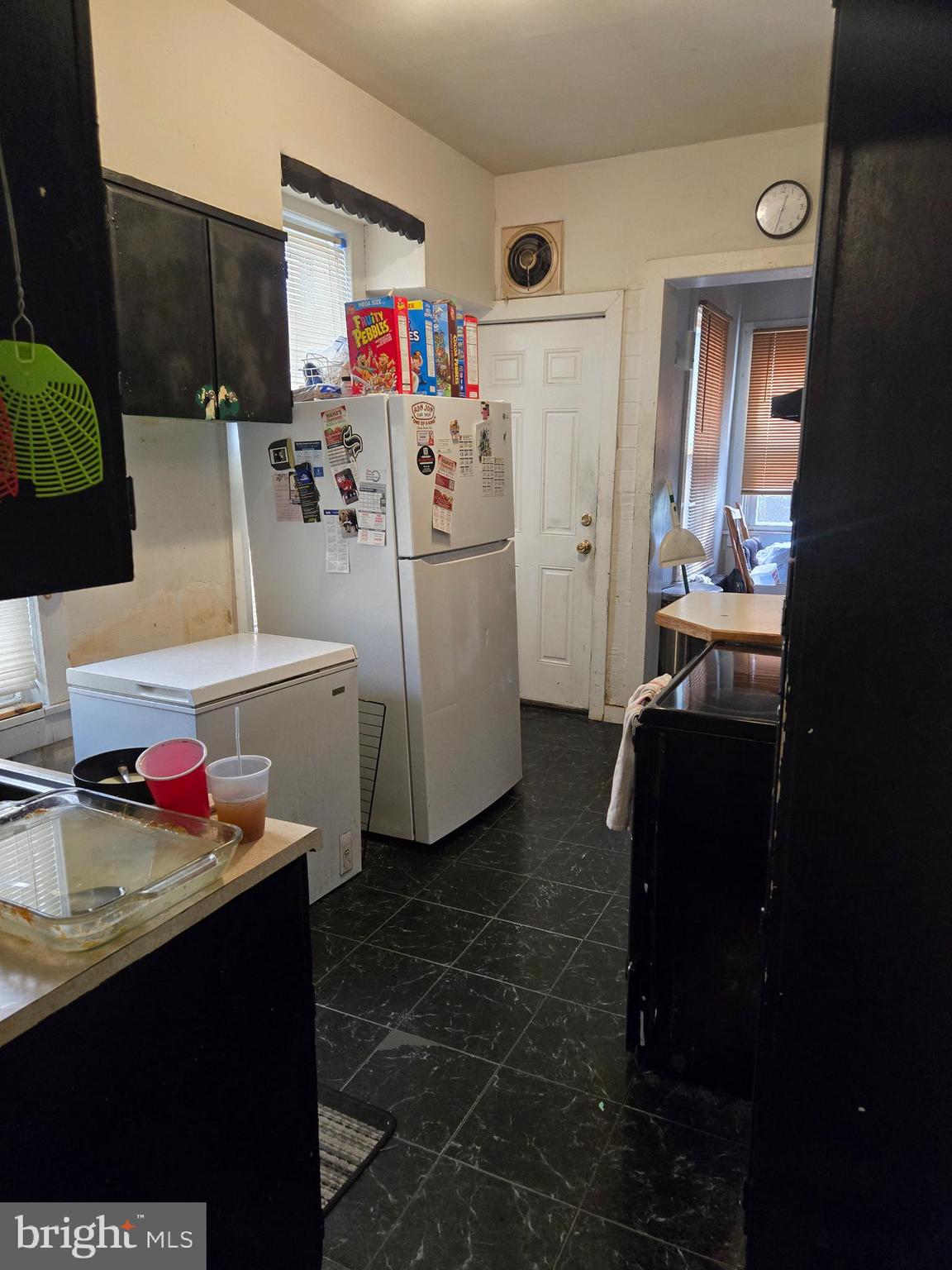 1238 Eckert Avenue Reading, PA 19602 - Photo 4 of 15 a utility room with cabinets washer and dryer
