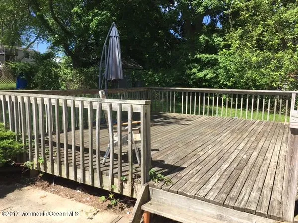 a view of a wooden roof deck