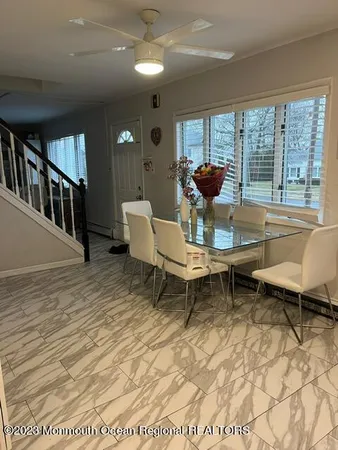 a living room with furniture and a table