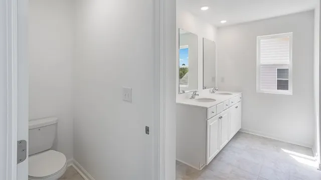 a bathroom with a sink a toilet and a bathtub