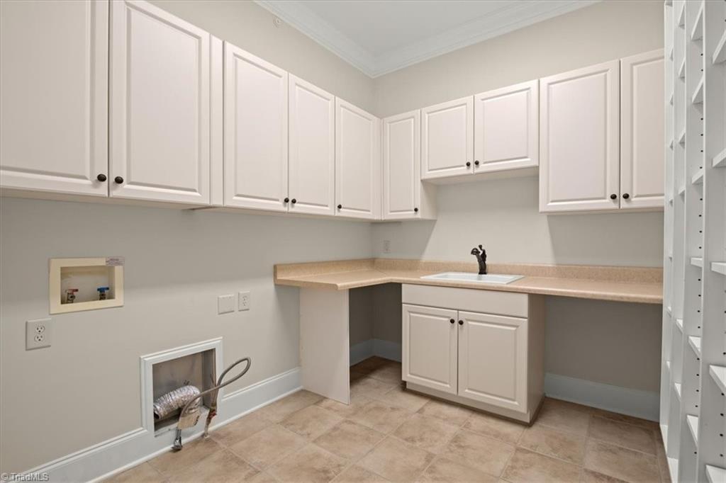 8400 Parkchester Place Oak Ridge, NC 27310 - Photo 25 of 49 ample laundry and storage room