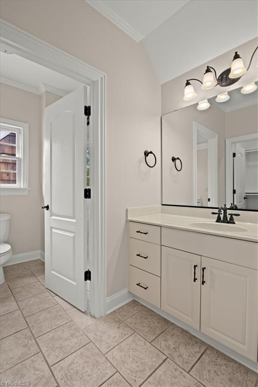 8400 Parkchester Place Oak Ridge, NC 27310 - Photo 38 of 49 bath 3 with separate vanity rooms and shared shower and commode room between Bedrooms Three and Four.