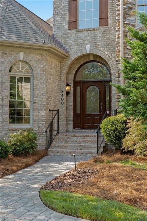 8400 Parkchester Place Oak Ridge, NC 27310 - Photo 5 of 49 front entry
