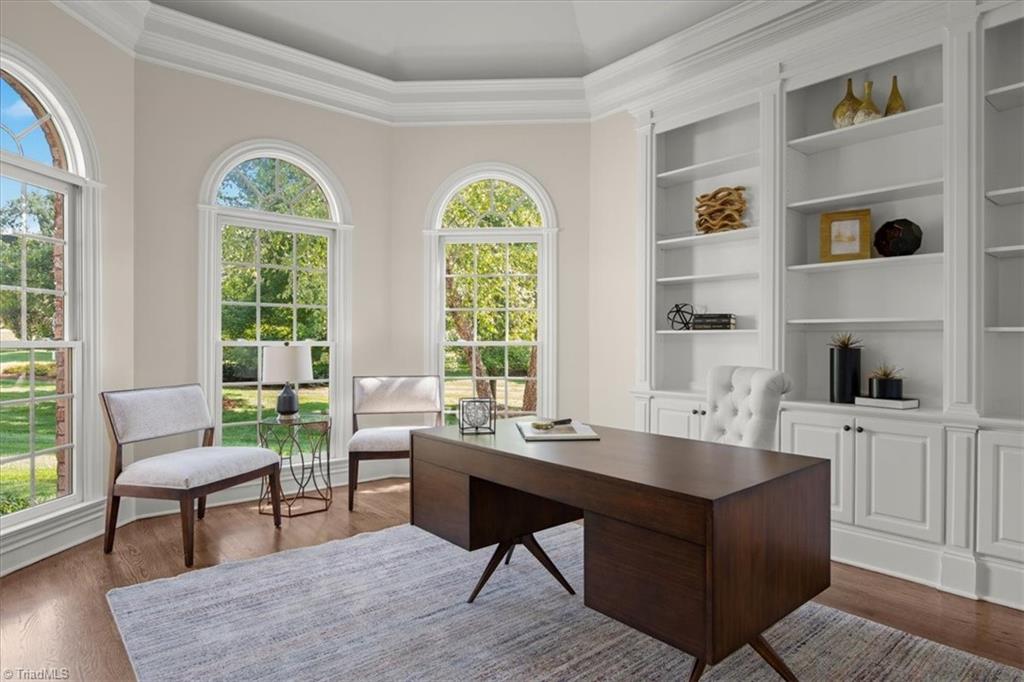 8400 Parkchester Place Oak Ridge, NC 27310 - Photo 8 of 49 office with floor to ceiling builtin shelves