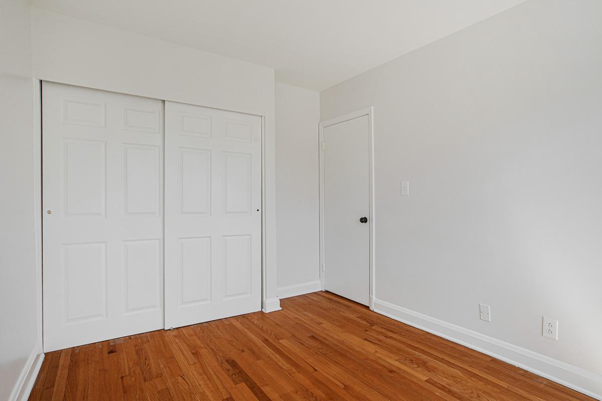 1016 Winsford Road Towson, MD 21204 - Photo 24 of 42 a view of empty room with wooden floor
