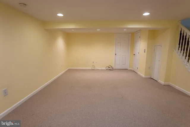 a view of a backyard with sitting area