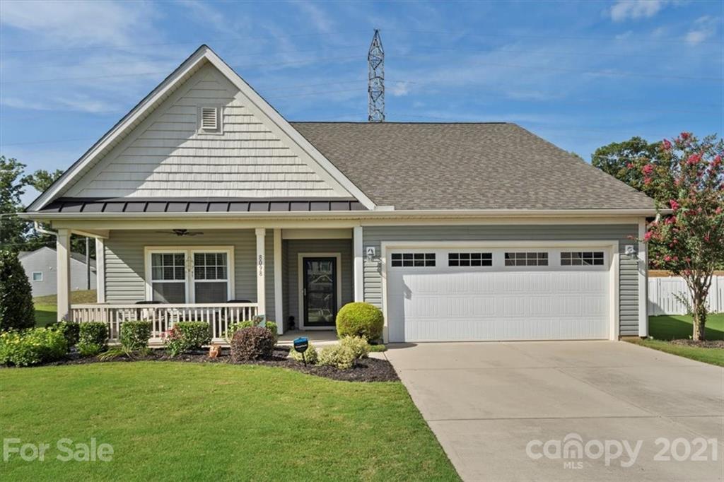 8098 Bryson Road Indian Land, SC 29707 - Photo 1 of 30 a front view of a house with garden