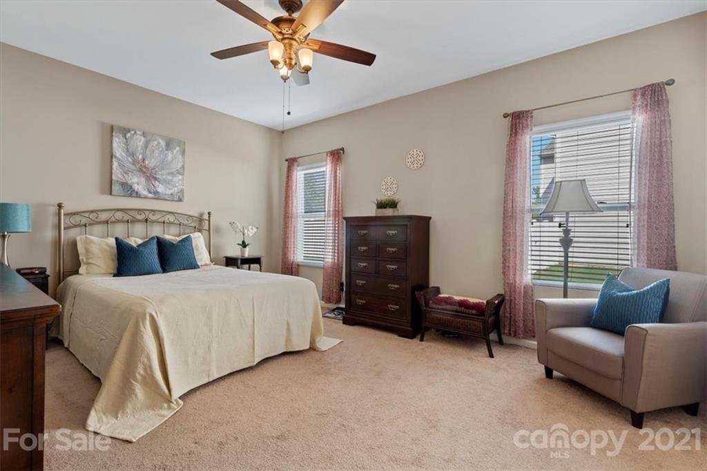 8098 Bryson Road Indian Land, SC 29707 - Photo 16 of 30 a bedroom with a bed and a couch