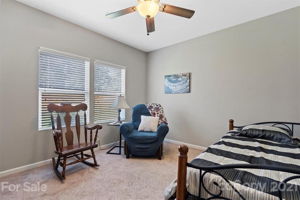 8098 Bryson Road Indian Land, SC 29707 - Photo 20 of 30 a bedroom with furniture and a window