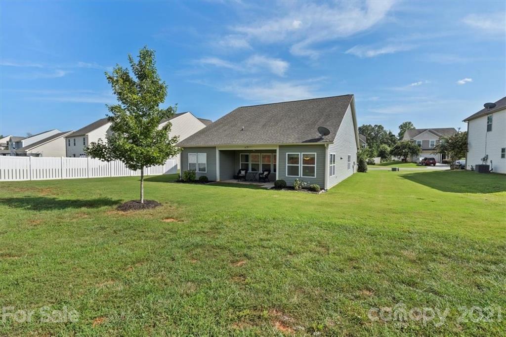 8098 Bryson Road Indian Land, SC 29707 - Photo 24 of 30 a house with garden in front of it