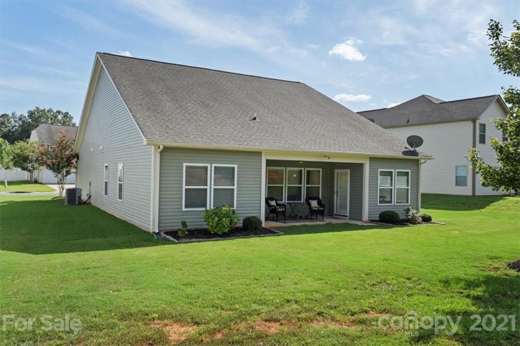8098 Bryson Road Indian Land, SC 29707 - Photo 26 of 30 a front view of a house with garden and porch