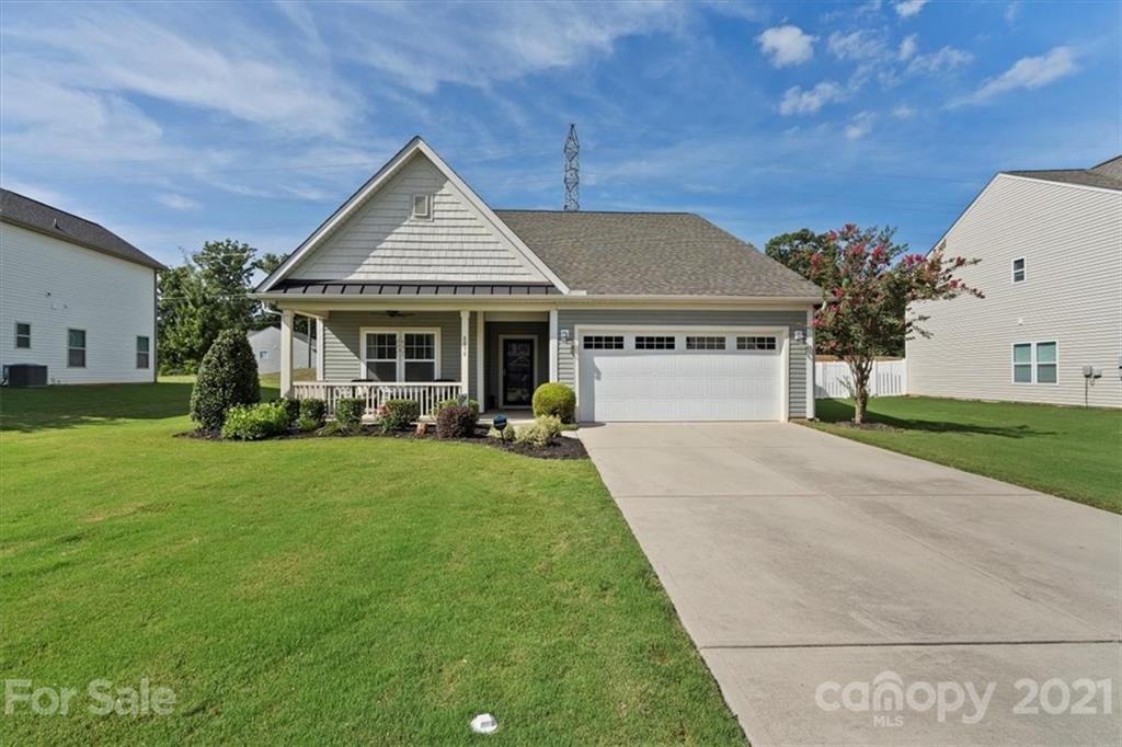 8098 Bryson Road Indian Land, SC 29707 - Photo 29 of 30 a front view of a house with a yard and garage