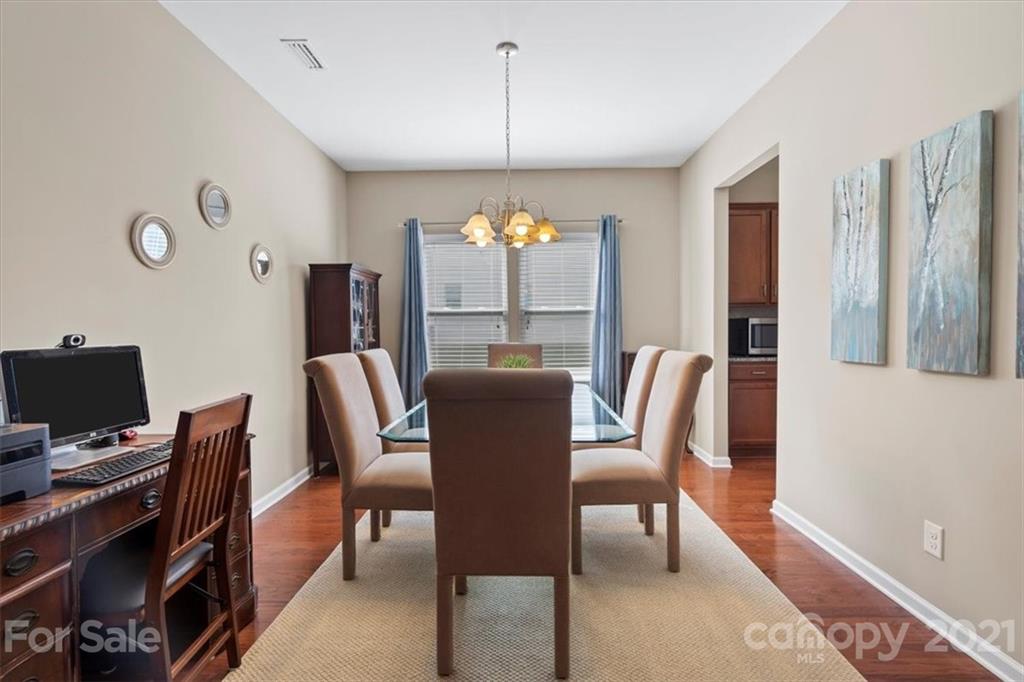 8098 Bryson Road Indian Land, SC 29707 - Photo 5 of 30 a view of a dining room with furniture window and outside view