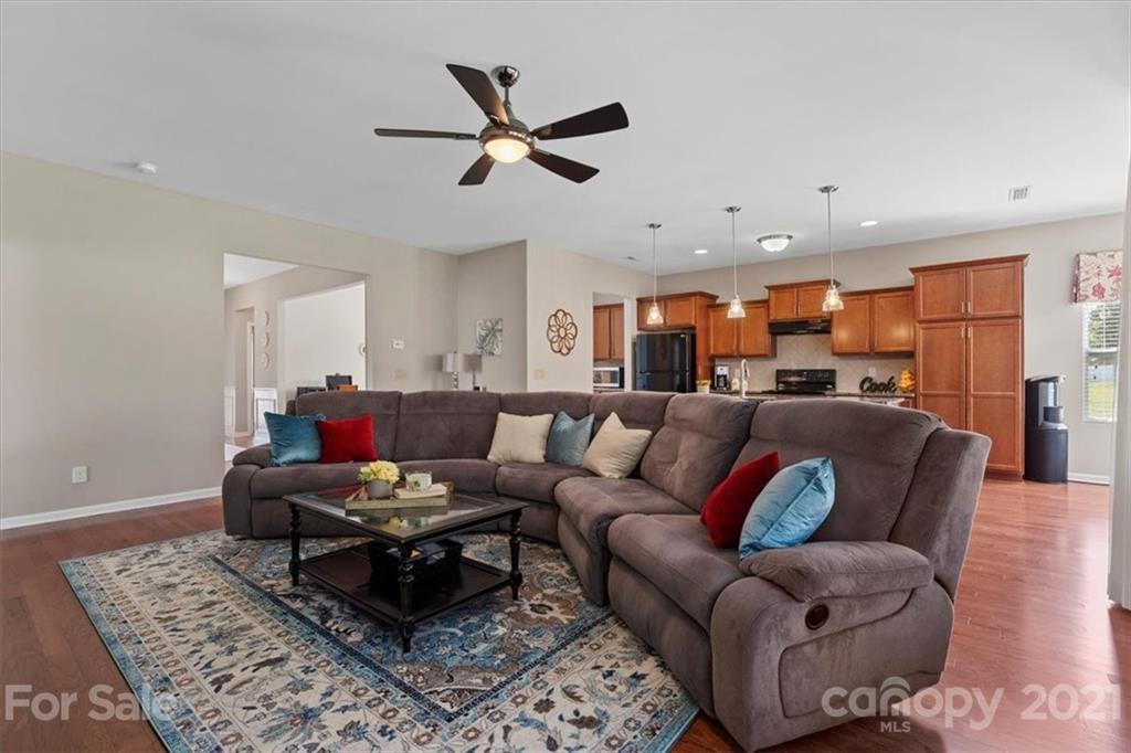 8098 Bryson Road Indian Land, SC 29707 - Photo 6 of 30 a living room with furniture and a rug