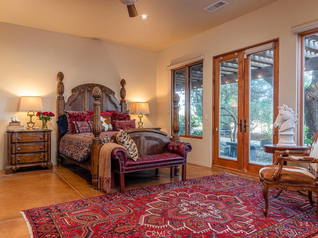 7790 Airport Road Paso Robles, CA 93446 - Photo 14 of 71 a bed room with a bed and a chair