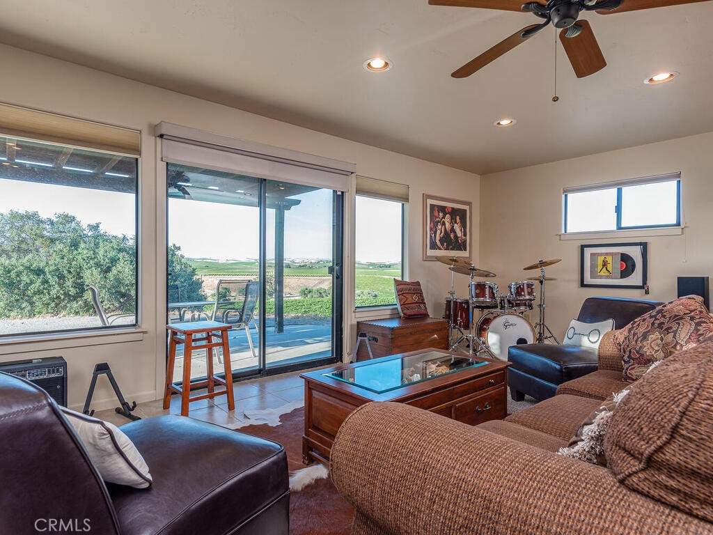 7790 Airport Road Paso Robles, CA 93446 - Photo 21 of 71 a living room with furniture and a large window