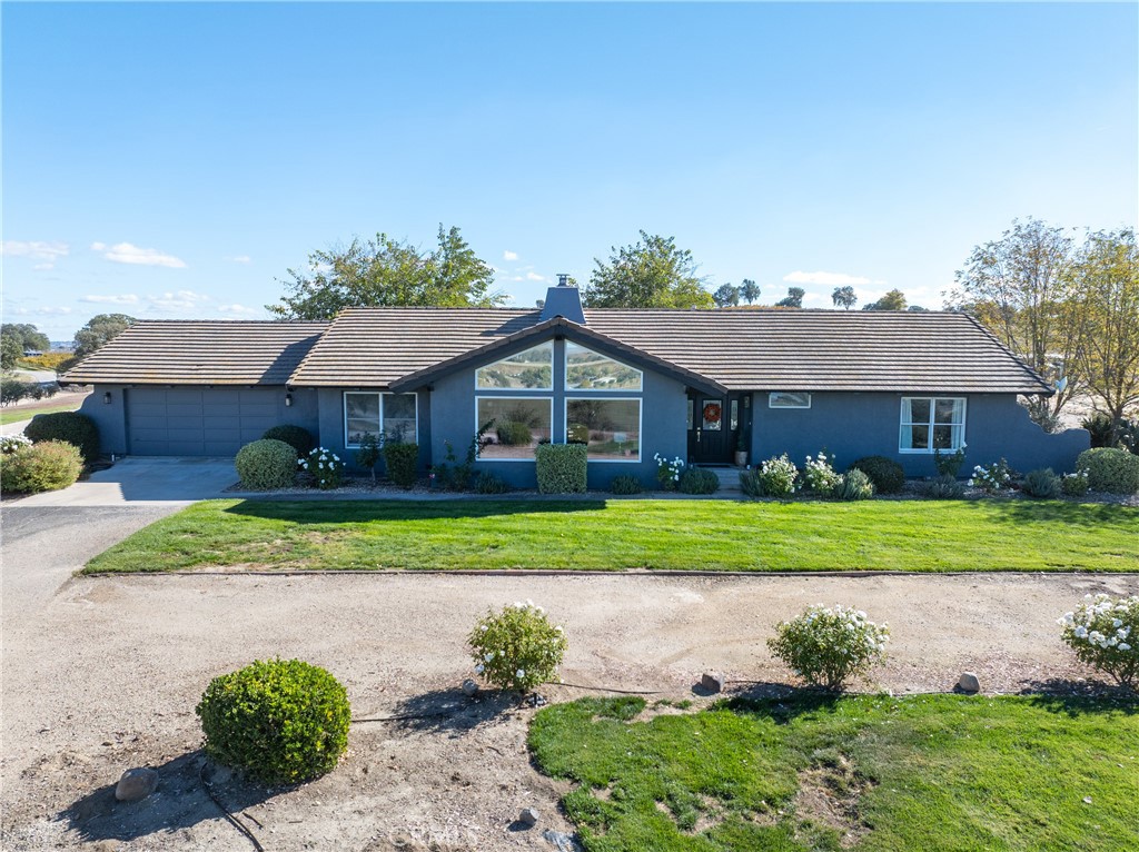 7790 Airport Road Paso Robles, CA 93446 - Photo 44 of 71 a front view of a house with a yard