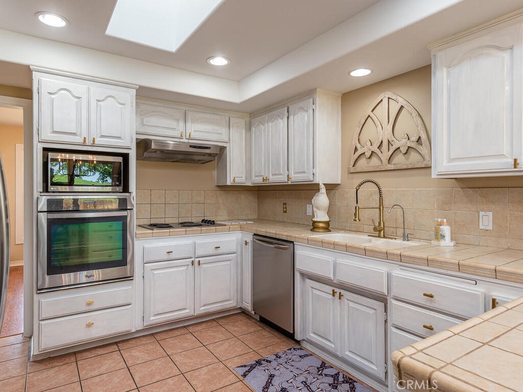 7790 Airport Road Paso Robles, CA 93446 - Photo 49 of 71 a kitchen with a sink cabinets and window