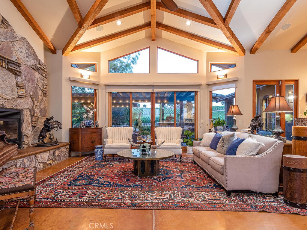 7790 Airport Road Paso Robles, CA 93446 - Photo 5 of 71 a living room with furniture a rug and a large window