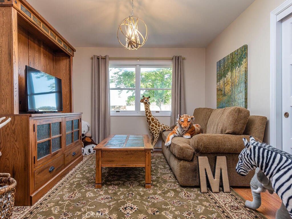 7790 Airport Road Paso Robles, CA 93446 - Photo 53 of 71 a living room with furniture and a window