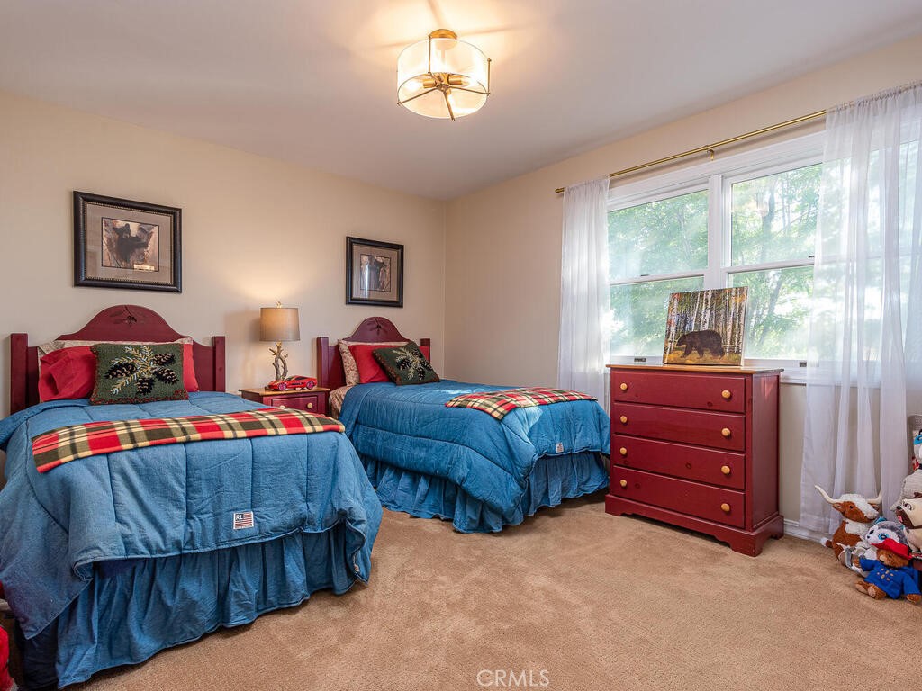 7790 Airport Road Paso Robles, CA 93446 - Photo 54 of 71 a bedroom with two beds and a window