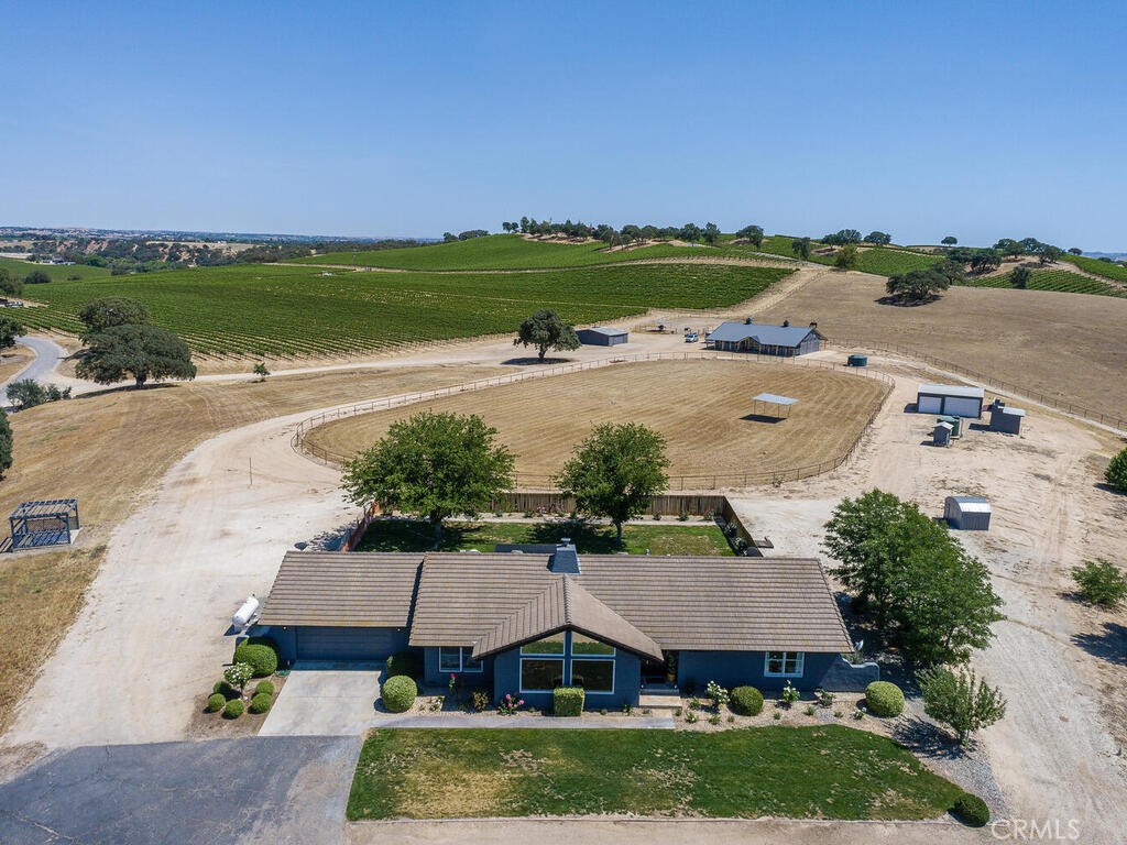 7790 Airport Road Paso Robles, CA 93446 - Photo 59 of 71 an aerial view of a house with outdoor space and lake view