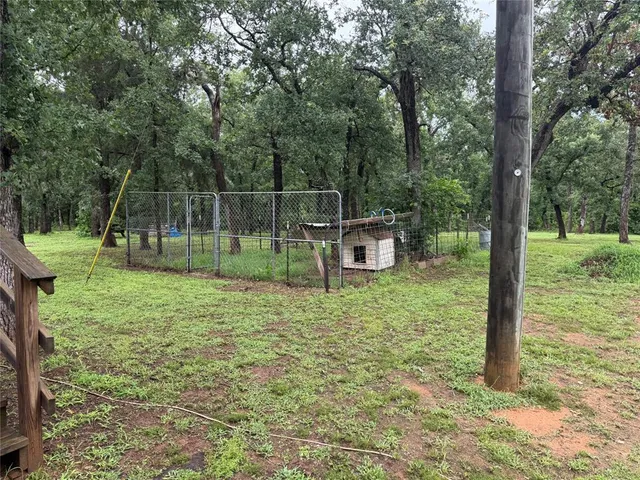 a house view with a backyard space
