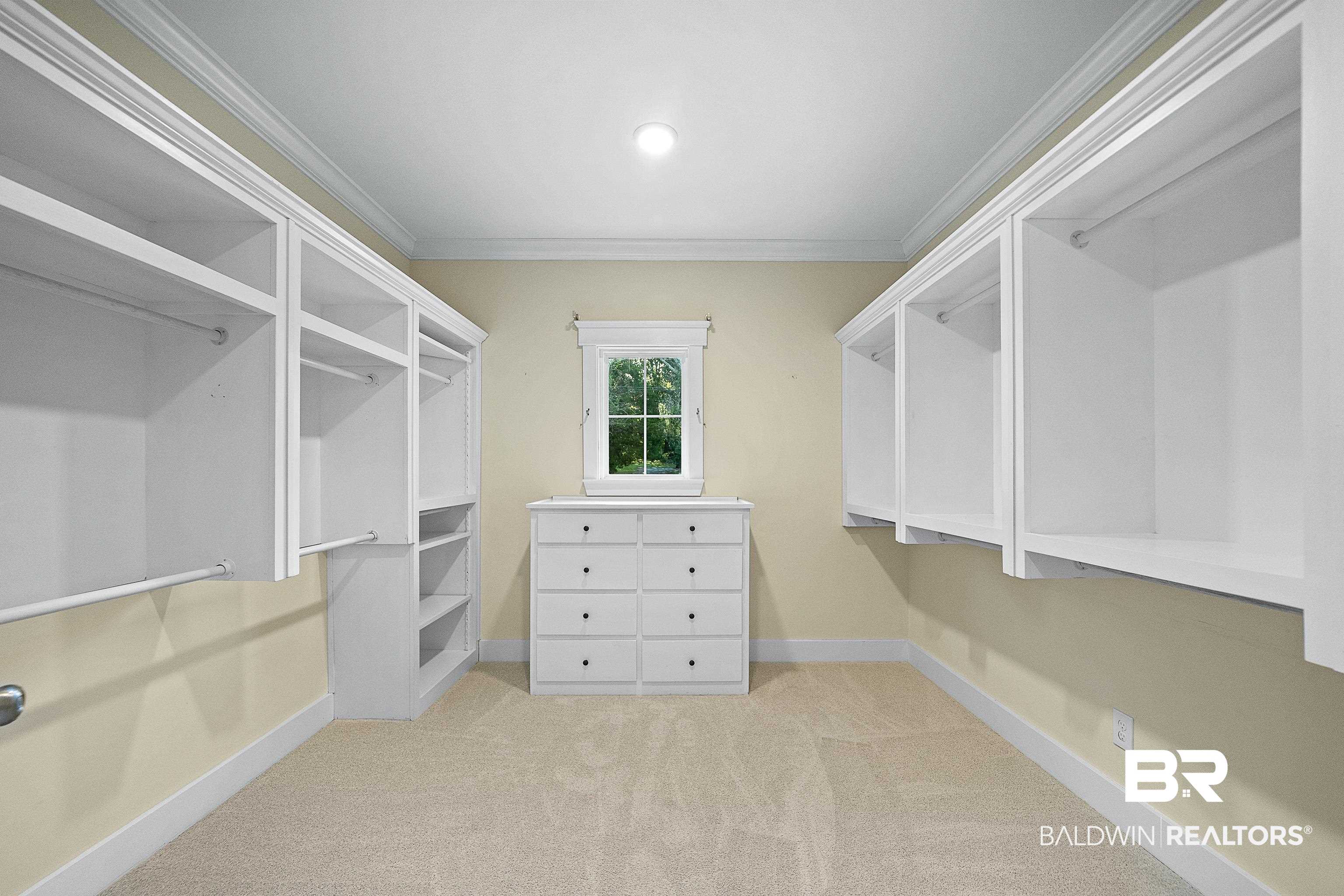 356 Liberty Street Fairhope, AL 36532 - Photo 15 of 39 Walk in closet with light colored carpet