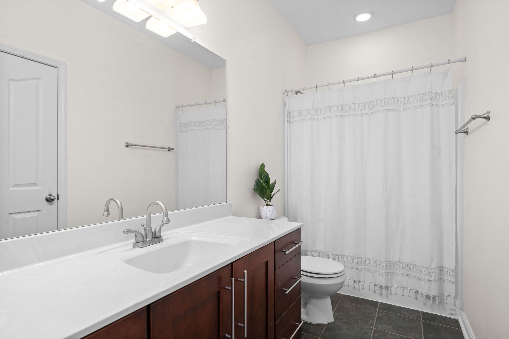 233 Barkers Mill Road Pembroke, KY 42266 - Photo 24 of 48 a bathroom with a double vanity sink toilet and a mirror