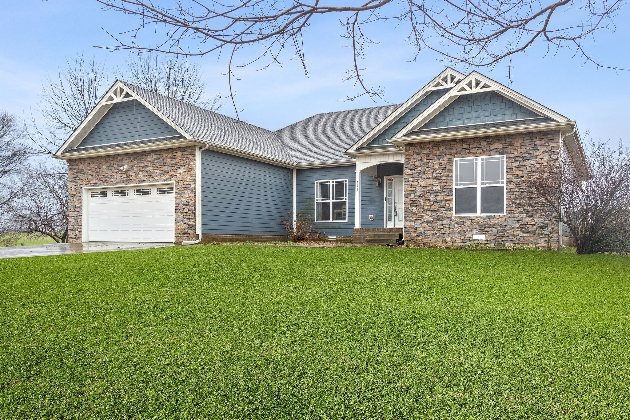 233 Barkers Mill Road Pembroke, KY 42266 - Photo 4 of 48 a front view of a house with a yard
