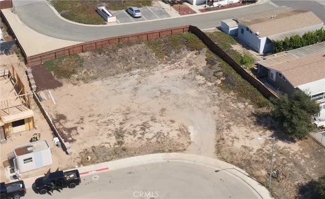 a view of balcony with wooden floor