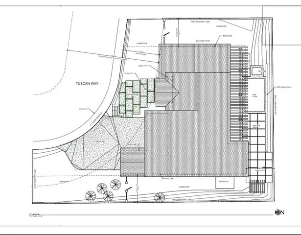 a white car parked on the side of road