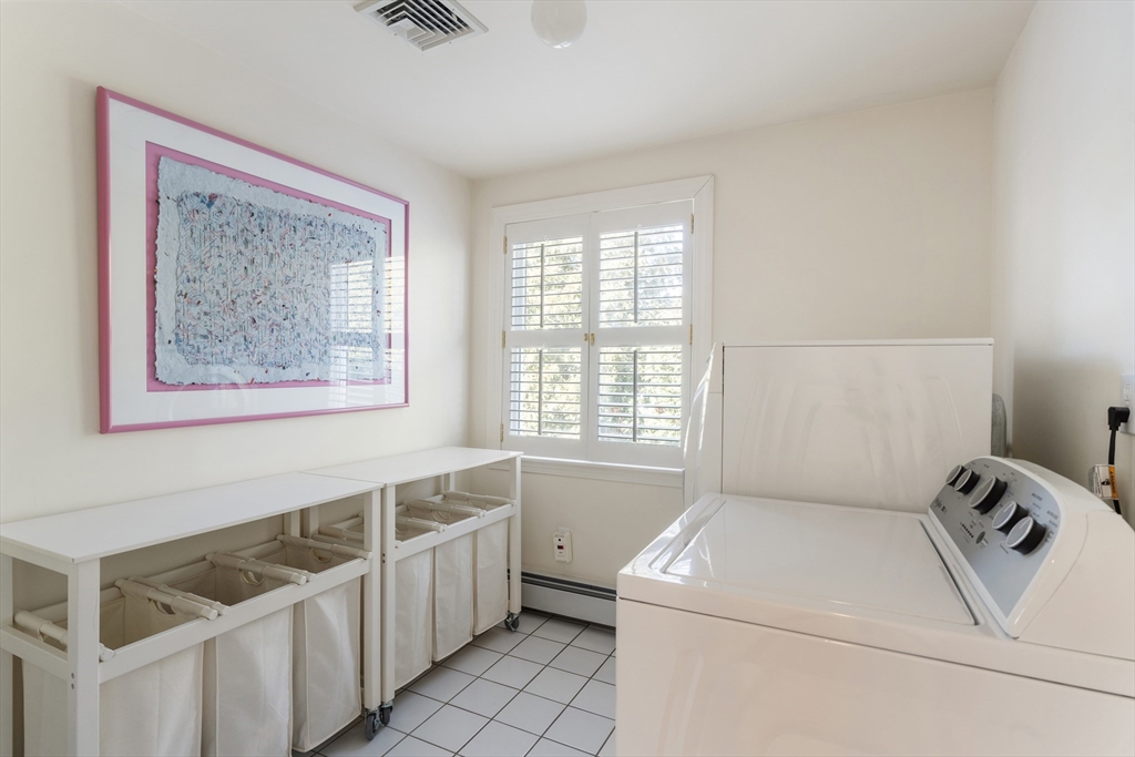 10 Redstone Lane Marblehead, MA 01945 - Photo 21 of 31 a utility room with dryer and washer