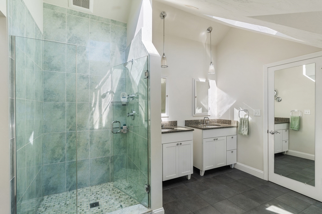 10 Redstone Lane Marblehead, MA 01945 - Photo 30 of 31 a bathroom with a granite countertop sink mirror and shower
