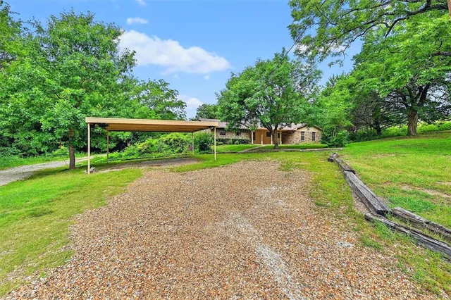 a view of a park and entertaining space