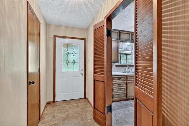 a view of front door and stairs