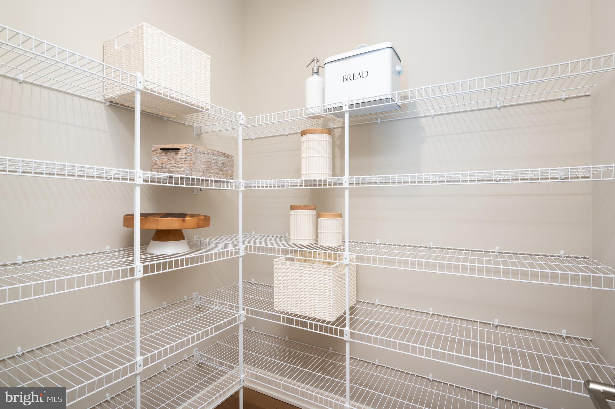 42108 Creighton Road Ashburn, VA 20148 - Photo 15 of 39 a view of a room with racks on the wall