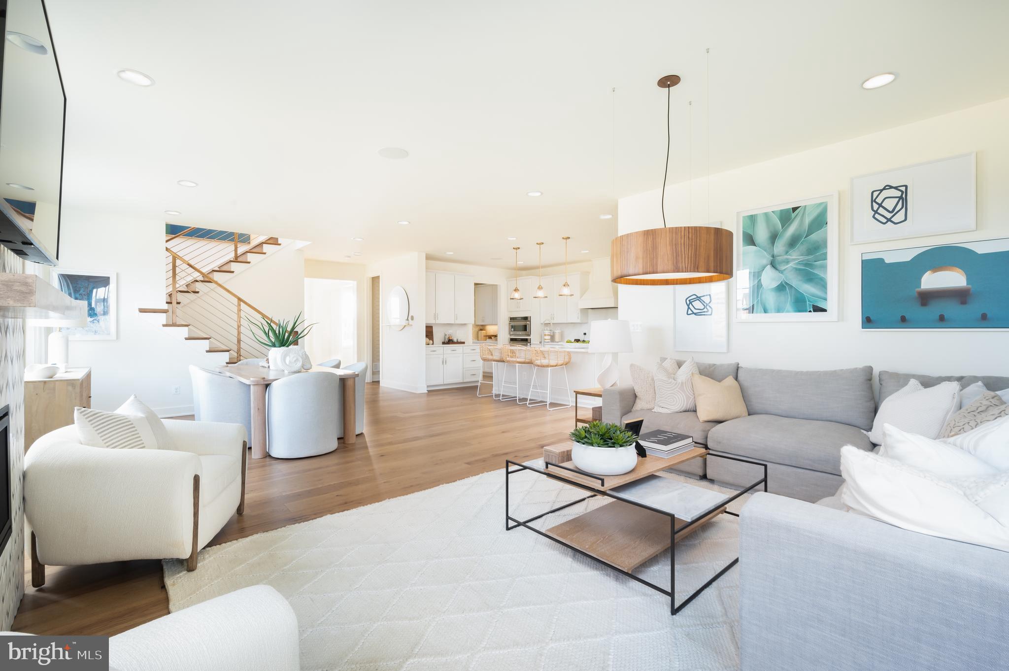 42108 Creighton Road Ashburn, VA 20148 - Photo 19 of 39 a living room with furniture and wooden floor