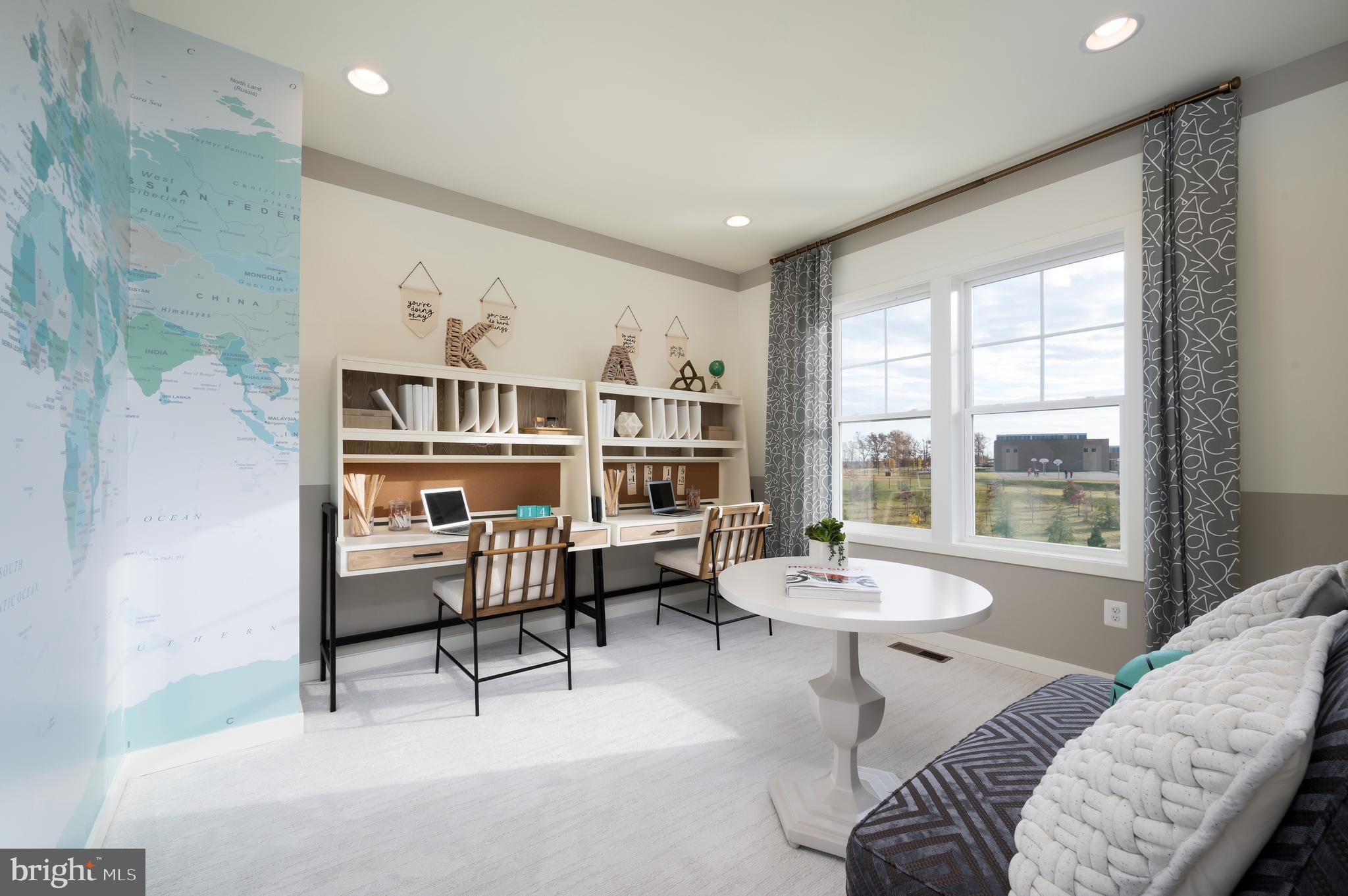 42108 Creighton Road Ashburn, VA 20148 - Photo 30 of 39 a living room with furniture and a window