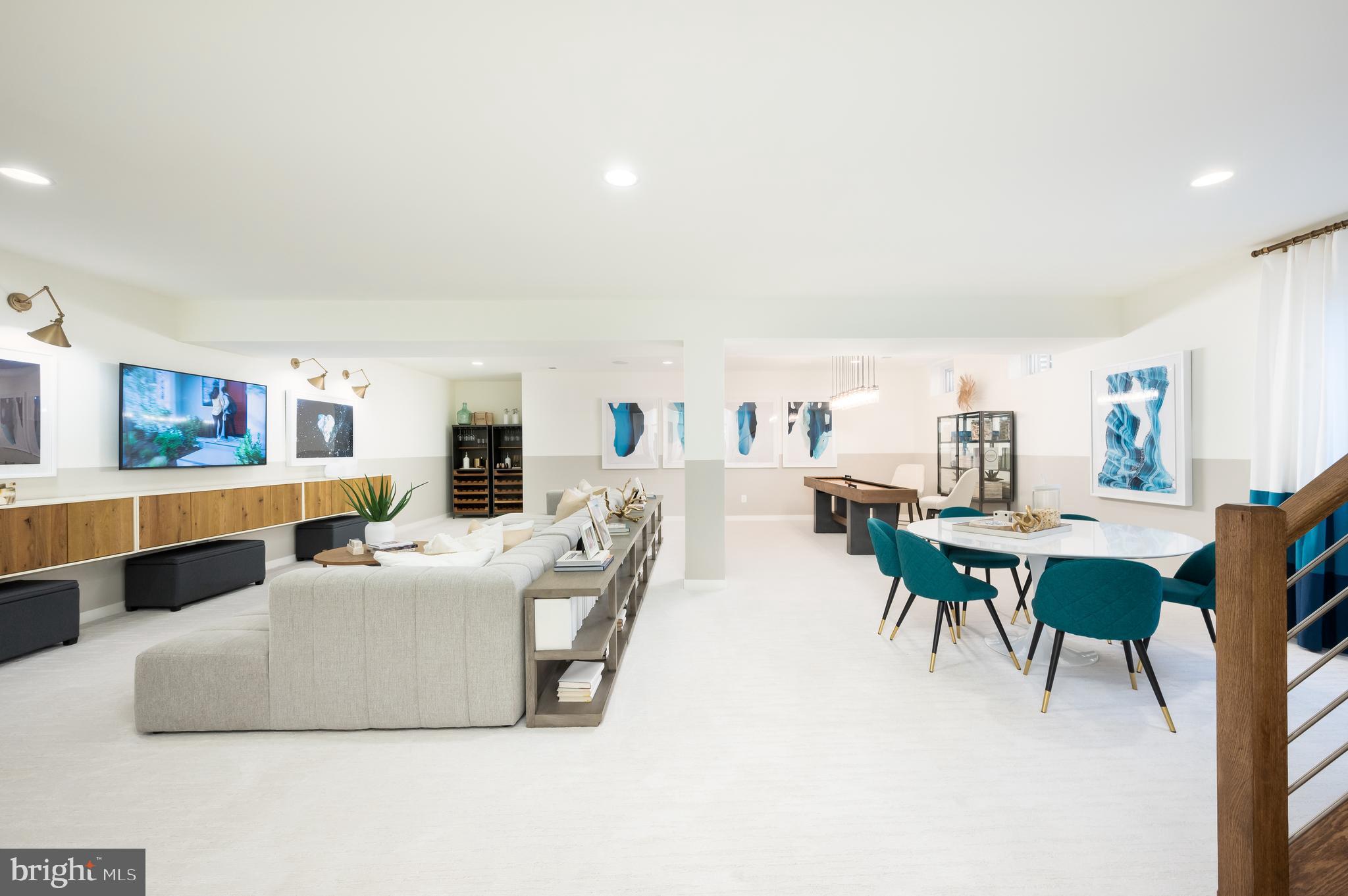 42108 Creighton Road Ashburn, VA 20148 - Photo 33 of 39 a living room with furniture and view of kitchen