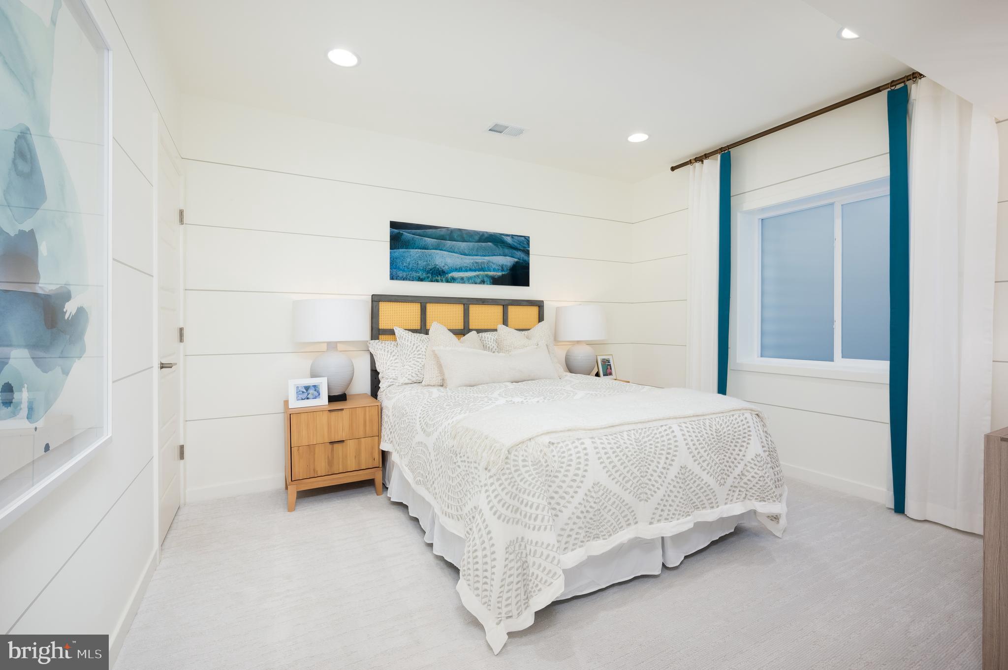 42108 Creighton Road Ashburn, VA 20148 - Photo 38 of 39 a bedroom with a bed and a painting