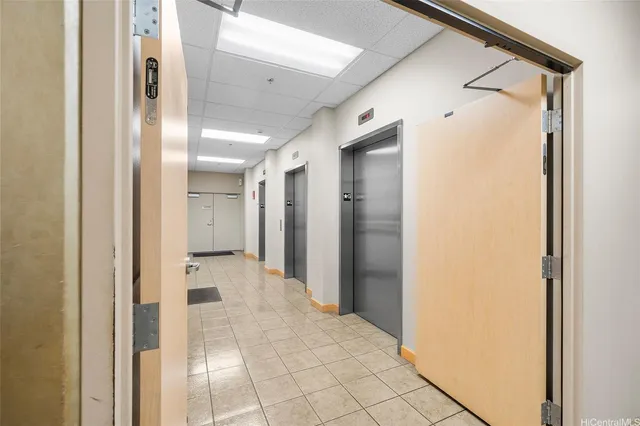 a view of a bathroom with a glass door shower