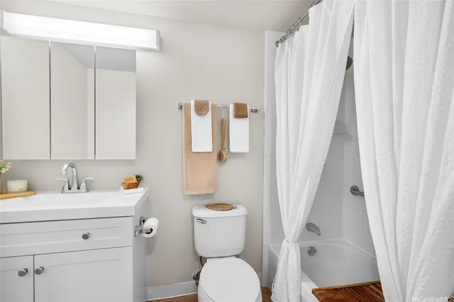 a bathroom with a sink and toilet