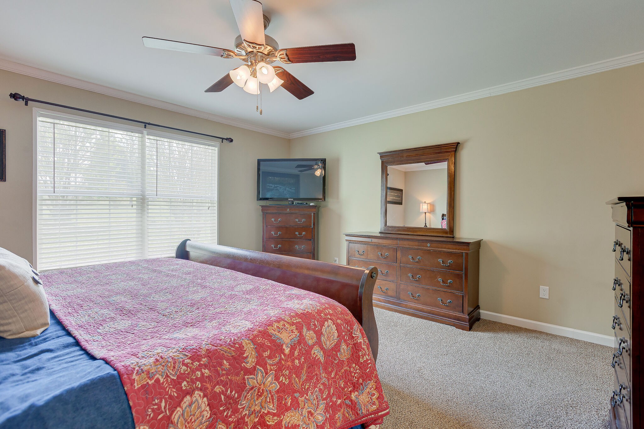 3349 Mahlon Moore Road Spring Hill, TN 37174 - Photo 17 of 28 a bedroom with a bed and a dresser