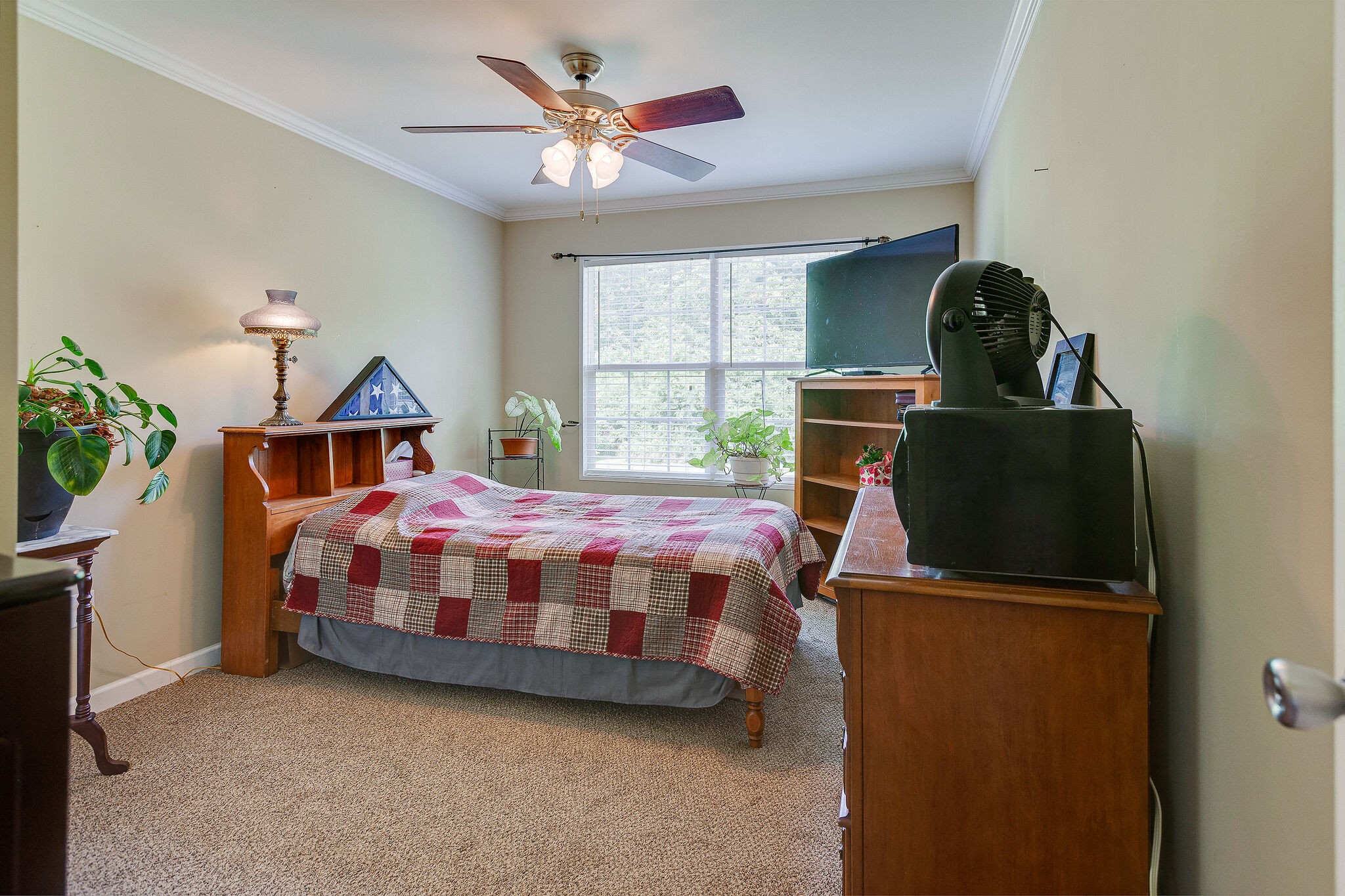 3349 Mahlon Moore Road Spring Hill, TN 37174 - Photo 19 of 28 a bedroom with a bed and a window